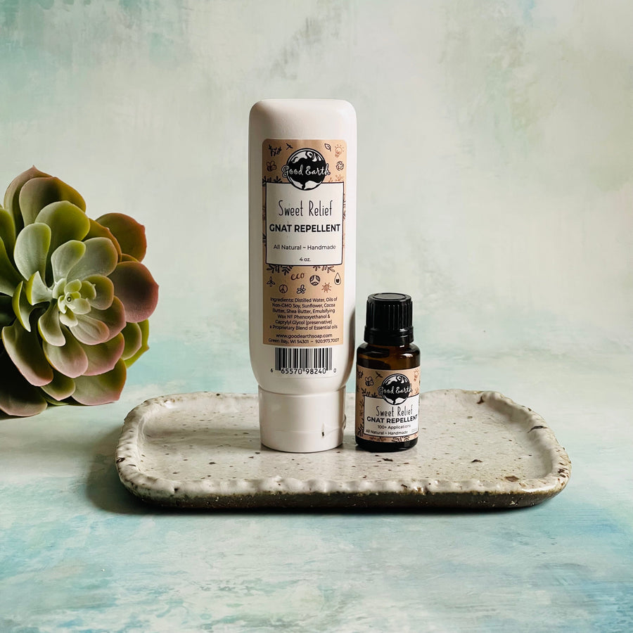 All natural gnat bug repellent made with essentials oils  in a lotion bottle and 1/2 ounces brown dropper bottle