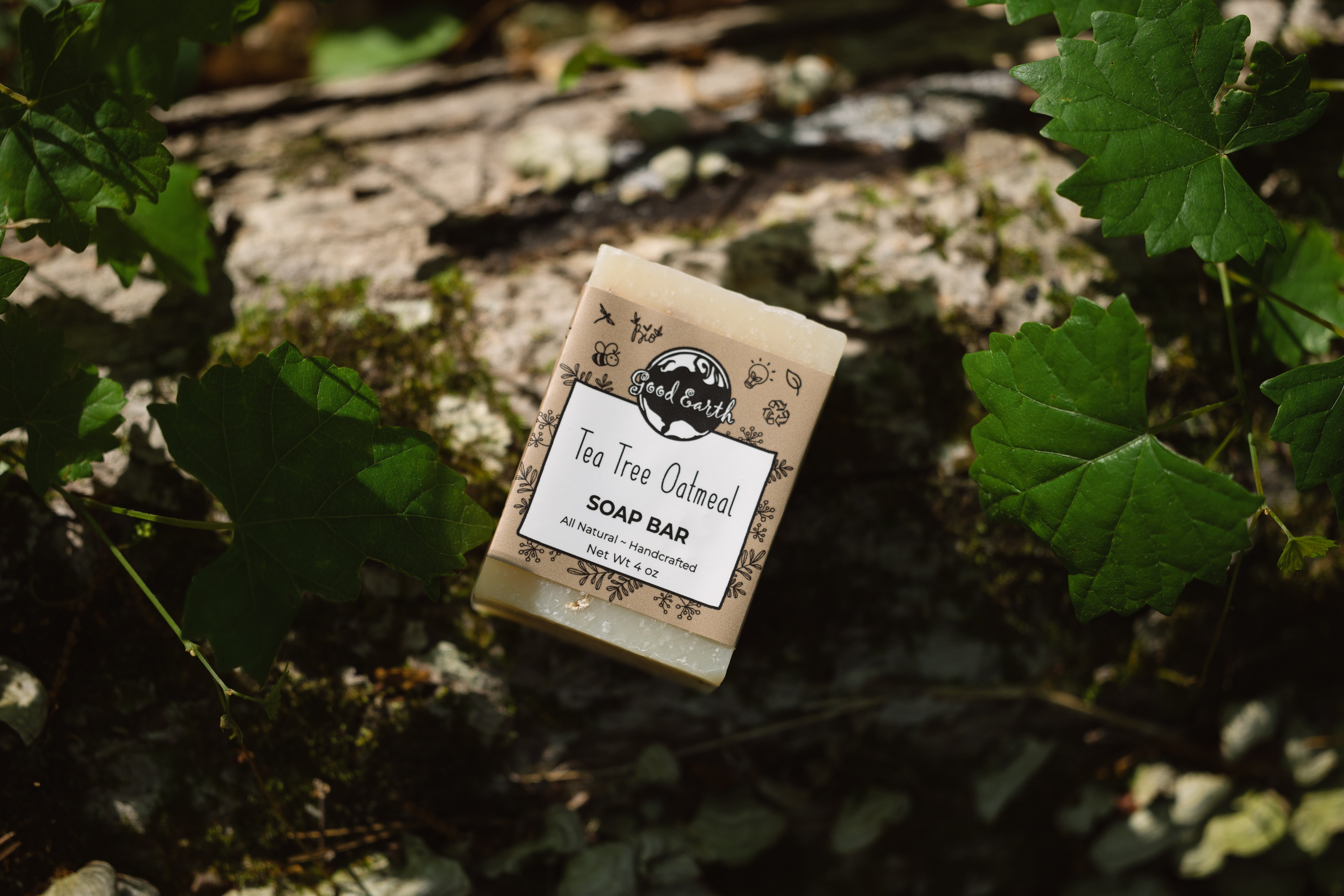 outdoor photo of tea tree soap bar on the forest floor